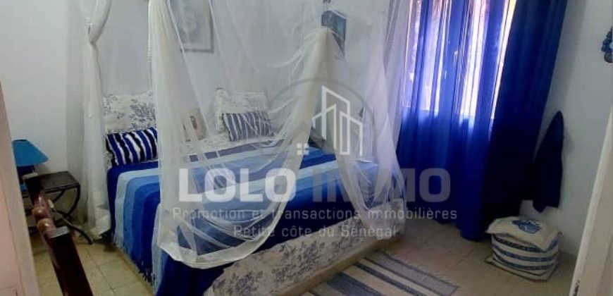 Ngaparou – Villa paisible au coeur d’un joyau arboré avec piscine à vendre